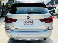 Vista trasera y cámara de reversa BMW X3 sDrive SUV
