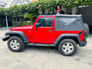 Vista lateral Jeep Wrangler Sport 2017 con toldo suave